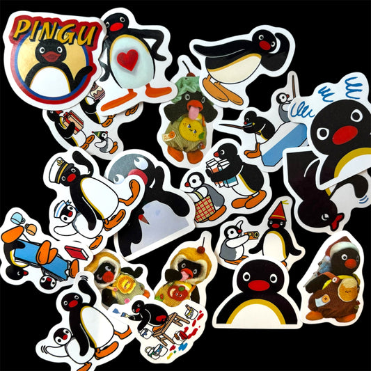 A spread of colorful Pingu stickers showing various playful scenes and expressions, on a black background.